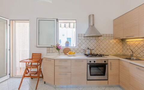 Vista Mare Da Rossella: Kitchen, Countertop, Kitchen Appliance, Interior Design, Flooring, Furniture, Major Appliance, Wood, Floor, Cabinetry