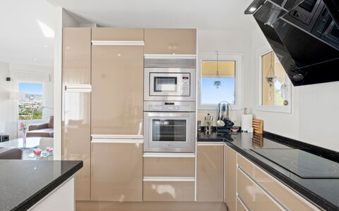 Pluma Ligera: Kitchen Appliance, Kitchen, Countertop, Cabinetry, Major Appliance, Interior Design, Furniture, Flooring, Home Appliance, Wood