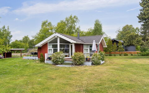 Hjalmine - 225M from the Sea: Vegetation, Shrub, Spring, Cottage, Garden, Shade, Backyard, Yard, Chair