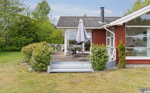 Hjalmine - 225M from the Sea: Vegetation, Shrub, Spring, Cottage, Garden, Shade, Backyard, Yard, Chair