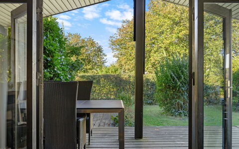 Kajsa - 250M from the Sea: Wood, Furniture, Porch, Chair, Outdoor Furniture, Flooring, Floor, Interior Design, Deck, Glass