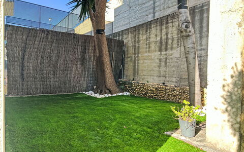 Les Aigües: Lawn, Garden, Artificial Turf, Backyard, Yard, Landscaping, Shade, Courtyard