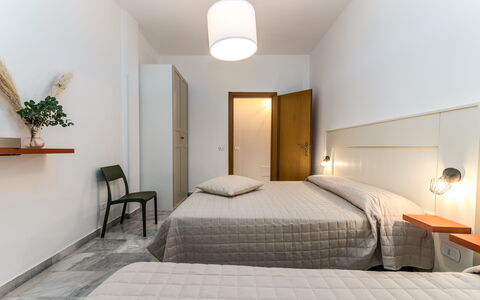 Villa Coralia: Interior Design, Bed, Bedroom, Wall, Furniture, Flooring, Bed Sheet, Bedding, Floor, Ceiling