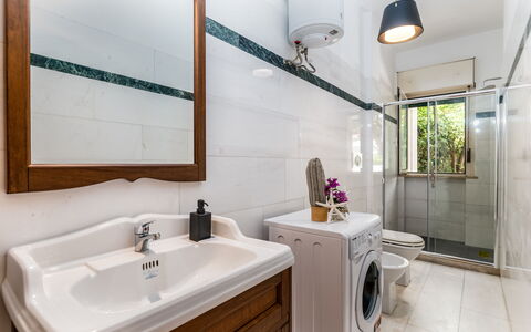 Villa Coralia: Interior Design, Plumbing Fixture, Flooring, Sink, Bathroom Cabinet, Tap, Bathroom, Floor, Plumbing, Home