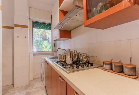 Villa Nami: Kitchen, Kitchen Appliance, Countertop, Major Appliance, Wood, Flooring, Interior Design, Kitchen Sink, Floor, Cabinetry