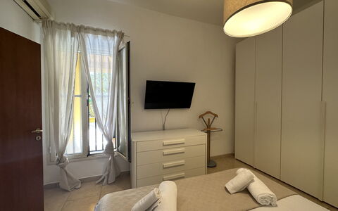 Villa Azzurra: Furniture, Interior Design, Floor, Bedroom, Flooring, Wood, Bed, Room, Lighting, Bedding