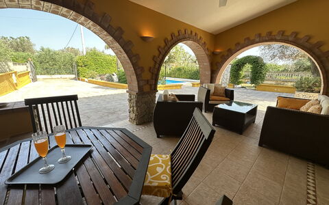 Villa Azzurra: Furniture, Interior Design, Arch, Flooring, Ceiling, Chair, Couch, Shade, Living Room