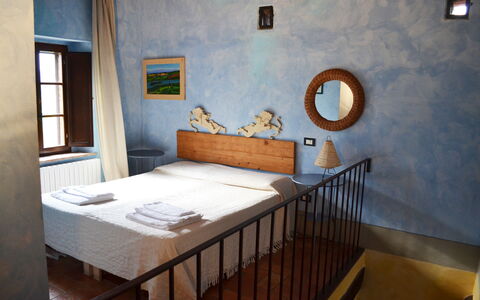 Appartamento La Torretta Di Pietra, Wifi, Perugia: Wall, Furniture, Interior Design, Bedroom, Floor, Flooring, Home, Bed, Bed Frame, Door