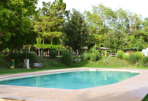 Appartamento Scuderia Del Borgo, Wifi, Perugia: Swimming Pool, Tree, Resort, Shade, Garden, Outdoor Furniture, Leisure, Backyard, Landscaping, Water Feature