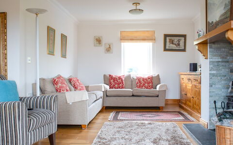 Creagan: Furniture, Interior Design, Couch, Flooring, Floor, Wood, Living Room, Room, Ceiling, Table