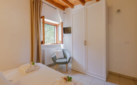 Trullo Quattro Carrini: Wood, Interior Design, Flooring, Floor, Ceiling, Bedroom, Room, Bed, Home, Wood Stain