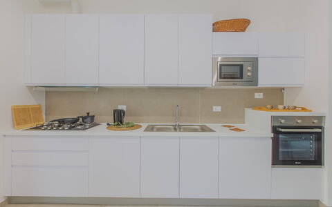 Casa Nonna Netta: Kitchen, Kitchen Appliance, Countertop, Major Appliance, Interior Design, Wood, Cabinetry, Flooring, Kitchen Stove, Stove