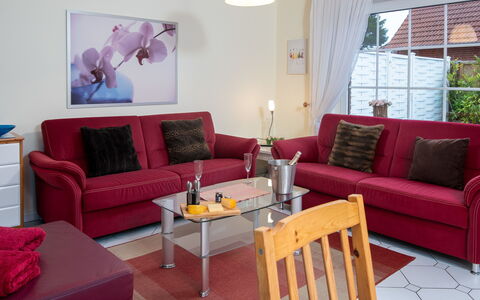 Krebs: Furniture, Interior Design, Couch, Flooring, Living Room, Floor, Wood, Room, Table, Apartment