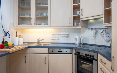 Krebs: Kitchen, Kitchen Appliance, Countertop, Cabinetry, Major Appliance, Wood, Furniture, Interior Design, Home Appliance, Flooring