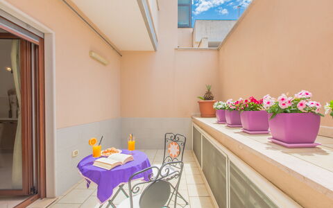 La Nuvola Sui Pedali: Interior Design, Flooring, Floor, Pink, Apartment, Flowerpot, Houseplant, Molding, Wood Stain, Balcony