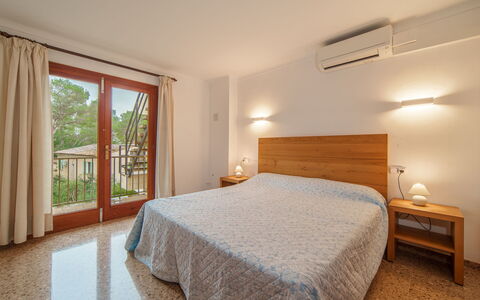 Cas Padrins de Santanyi: Interior Design, Flooring, Furniture, Floor, Wood, Bed, Ceiling, Bedroom, Room, Lighting
