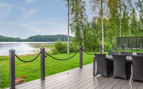 Villa Karhenhelmi: Furniture, Interior Design, Flooring, Floor, Table, Ceiling, Kitchen & Dining Room Table, Lighting, Chair, Home
