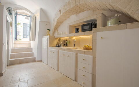 Casa Tosca: Wall, Interior Design, Flooring, Floor, Ceiling, Home, Room, Apartment, Cabinetry, Countertop
