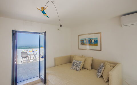 Casa Bolero: Furniture, Apartment, Floor, Shade, Hotel, Chair, Hardwood, Villa, Balcony, Pillow