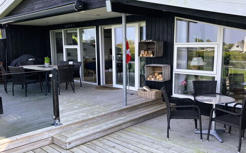 Carlene - 350M from the Sea: Wood, Furniture, Porch, Wood Flooring, Deck, Hardwood, Door, Outdoor Furniture, Chair, Shade