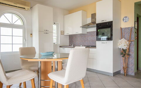 Alma: Furniture, Interior Design, Flooring, Floor, Wood, Chair, Ceiling, Room, Kitchen, Lighting