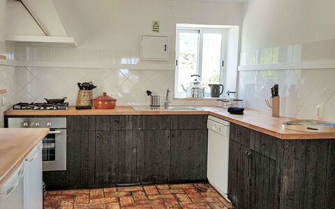 Luz Algarve - Vip Properties: Kitchen, Countertop, Flooring, Wood, Cabinetry, Kitchen Appliance, Floor, Major Appliance, Interior Design, Furniture