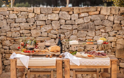 Masseria Le Monache: Furniture, Food, Tablecloth, Outdoor Furniture, Serveware, Linens, Lunch, Fruit, Outdoor Table, Picnic