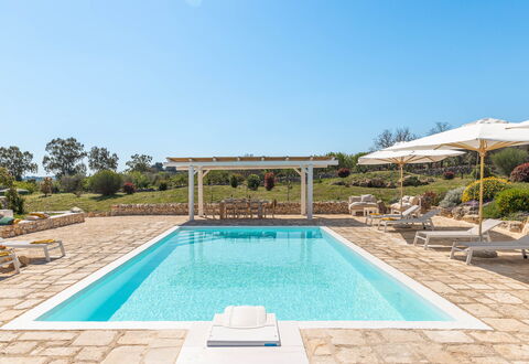 Masseria Le Monache: Swimming Pool, Composite Material, Outdoor Furniture, Resort, Chair, Shade, Landscaping, Garden, Eco Hotel, Flagstone