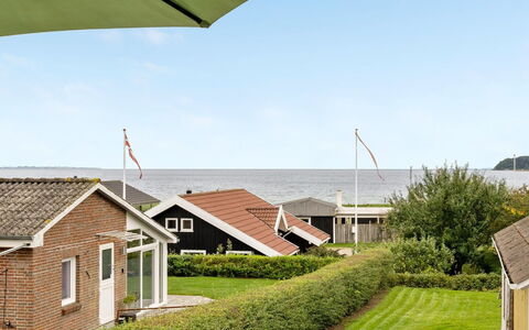 Maleen - 100M from the Sea: Roof, House, Home, Cottage, Door, Siding, Deck, Porch, Plank, Hardwood