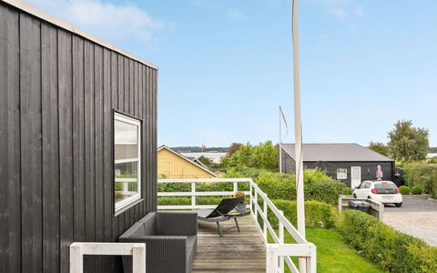 Maleen - 100M from the Sea: Roof, House, Home, Cottage, Door, Siding, Deck, Porch, Plank, Hardwood