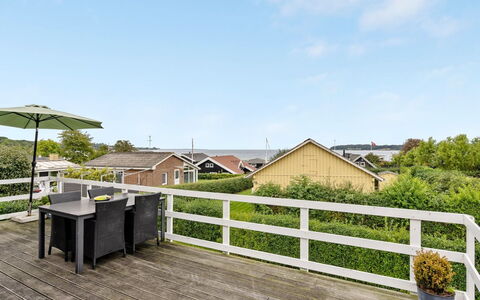 Maleen - 100M from the Sea: Roof, House, Home, Cottage, Door, Siding, Deck, Porch, Plank, Hardwood