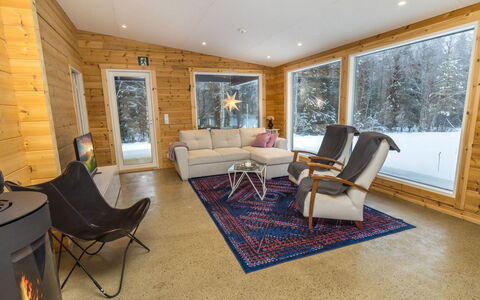 Villa Tuisku: Wood, Furniture, Log Cabin, Living Room, Hardwood, Cottage, Wood Flooring, Wood Stain, Winter