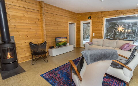 Villa Tuisku: Wood, Flooring, Interior Design, Furniture, Floor, Wood Flooring, Home, Ceiling, Living Room, Couch
