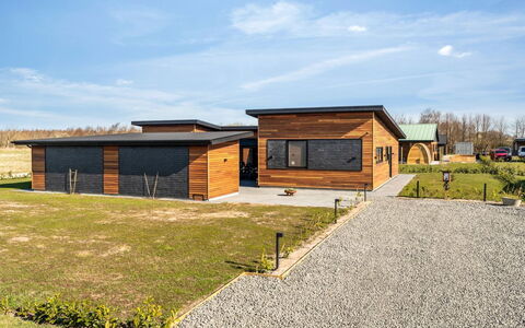 Ilze - from the Sea: Sky, Grass, Roof, Home, House, Land Lot, Cloud, Plain, Cottage, Siding
