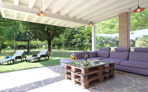 Silea Apartments, Pool, Garden, Treviso: Furniture, Outdoor Furniture, Shade, Chair, Outdoor Table, Outdoor Structure, Garden, Patio, Backyard