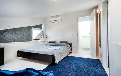 Cala Marina: Interior Design, Flooring, Floor, Wall, Furniture, Ceiling, Room, Bedroom, Bed, Lighting