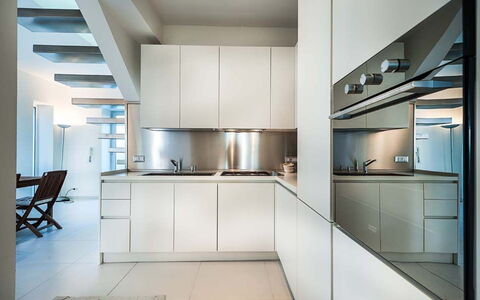 Cala Marina: Kitchen, Kitchen Appliance, Interior Design, Countertop, Flooring, Cabinetry, Major Appliance, Ceiling, Floor, Architecture