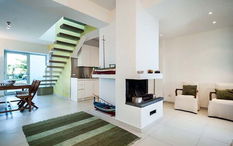 Cala Marina: Furniture, Interior Design, Flooring, Floor, Wall, Ceiling, Room, Wood, Living Room, Couch