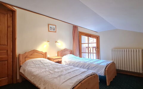 Alpina Lodge: Bed, Furniture, Wood, Bedroom, Interior Design, Bed Sheet, Ceiling, Floor, Room, Bedding