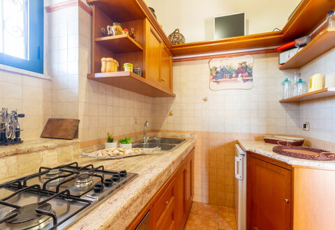 Luxury Private Villa With Garden: Kitchen, Kitchen Appliance, Countertop, Major Appliance, Wood, Interior Design, Flooring, Kitchen Sink, Cabinetry, Kitchen Stove