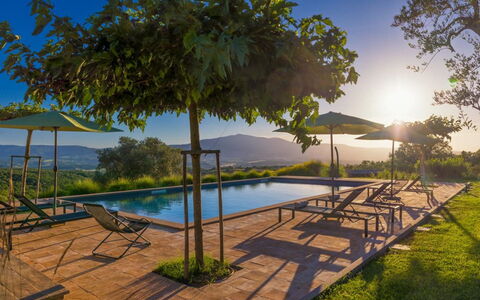 Podere Vigna Nuova: Sky, Natural Landscape, Hill, Landscape, Land Lot, Swimming Pool, Mountain Range, Outdoor Furniture, Plantation, Eco Hotel