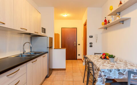 Teto: Interior Design, Flooring, Floor, Room, Ceiling, Apartment, Wood Flooring, Wood Stain, Chair, Hardwood