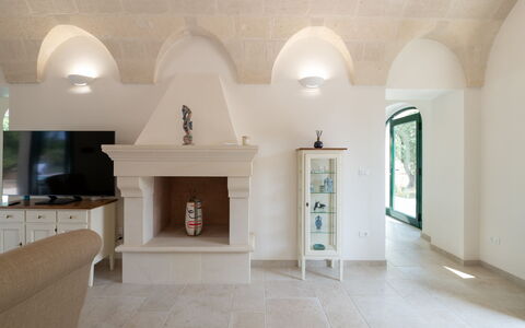 Villa Prestige: Wall, Flooring, Interior Design, Floor, Furniture, Ceiling, Lighting, Room, Light Fixture, Living Room