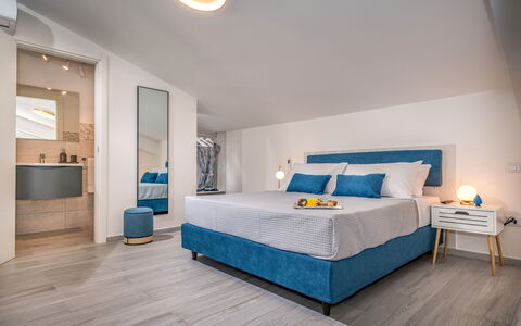 Attico Sea View: Furniture, Interior Design, Flooring, Bedroom, Floor, Bed, Wood, Room, Ceiling, Apartment