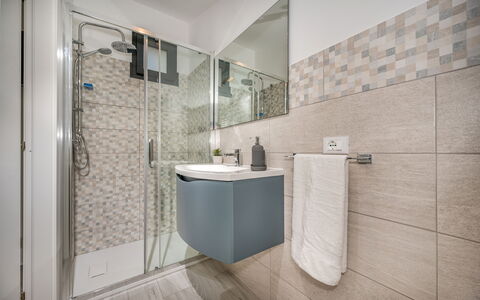 Attico Sea View: Bathroom, Flooring, Plumbing Fixture, Interior Design, Floor, Tap, Tile, Plumbing, Sink, Toilet