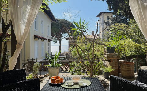 Apartment Niko, Private Garden, Wifi - Opatija: Furniture, Flowerpot, Outdoor Furniture, Balcony, Shade, Chair, Houseplant, Porch, Yard