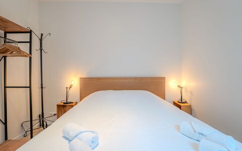 Sea of Tranquility with Terrace: Bed, Wall, Bedroom, Wood, Interior Design, Floor, Bed Sheet, Bedding, Flooring, Bed Frame