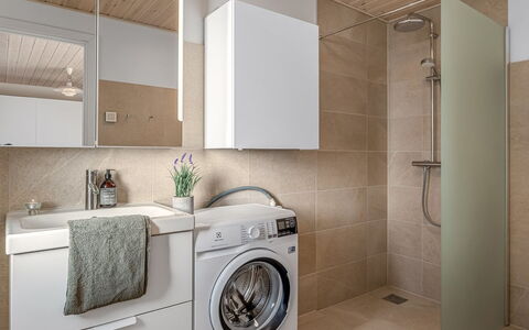 Kaapo - 300M from the Sea: Flooring, Interior Design, Floor, Wall, Plumbing Fixture, Bathroom Cabinet, Washing Machine, Ceiling, Sink, Bathroom