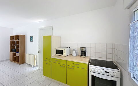 Le Chant des Sables: Flooring, Kitchen, Floor, Interior Design, Major Appliance, Furniture, Kitchen Appliance, Ceiling, Room, Countertop