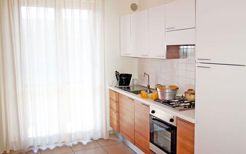 Marconi Seaside Residence, Pool, Wifi, Abruzzo: Kitchen, Flooring, Kitchen Appliance, Major Appliance, Interior Design, Countertop, Furniture, Wood, Cabinetry, Floor
